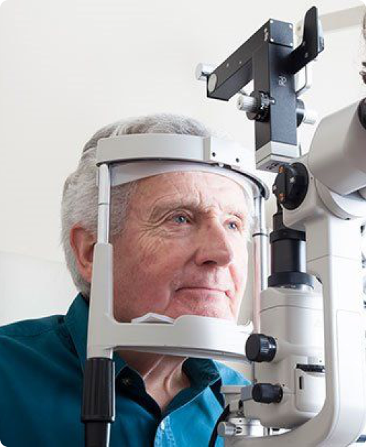 A patient receiving advanced retinal imaging during an eye examination