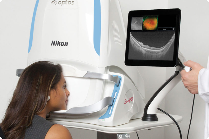 Patient receiving no-drop retinal imaging