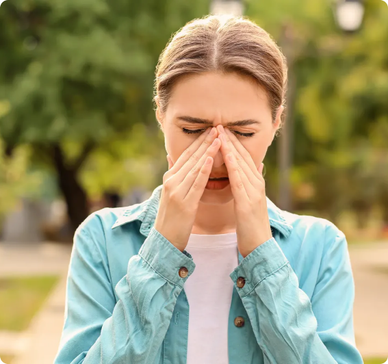 Woman with irritated eyes from allergies